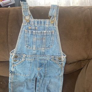 Genuine OshKosh overalls.
